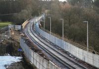 The Red Bridge over the Tweed at Galashiels, looking south from Winston Road towards Tweedbank on 8 February 2015, with track now laid and the pedestrian/cycling route moved to the west side of the line. [See image 45093] <br><br>[John Furnevel 08/02/2015]