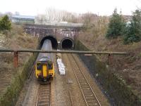 Northern unit 156428 enters the larger southbound bore of Farnworth Tunnel while working a service to Stalybridge on 5 February 2015. [See image 50273]<br><br>[John McIntyre 05/02/2015]