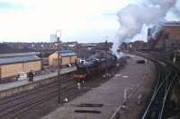 <I>And so to bed</I>. After being displayed in Chapel St station during an exhibition <I>Black 5</I> 44806 is hauled back to nearby <I>Steamport</I> by 3F 0-6-0T 47298. The locos are just passing the old excursion platforms with the then still operational coal yard behind. [See image 35064] for the same location thirty years later. <br><br>[Mark Bartlett //1979]