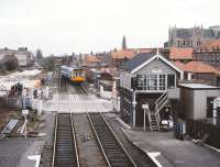 View south from Beverley station on 25 March 1989. 142085 is using the crossover to go right line heading back to Hull.<br><br>[Peter Todd 25/03/1989]