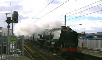 Stanier Pacific 46233 <I>Duchess of Sutherland</I> speeds northbound through Penrith on 31 January with the second <I>Winter Cumbrian Mountain Express</I> of 2015.<br><br>[Ken Browne 31/01/2015]