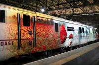 East Coast locomotive 91111 <I>'For the Fallen'</I> at Glasgow Central on the rear of the 0650 East Coast service to King's Cross on 10th February 2015.<br><br>[Colin McDonald 10/02/2015]