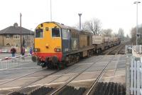 DRS EE Type 1 20312 brings up the rear of a four flask train for Heysham Power Station on the level crossing at Bare Lane on 12th February 2015. The lead locomotive on this leg was 20305. <br><br>[Mark Bartlett 12/02/2015]