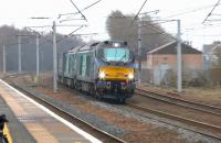 DRS 68004+68007 with the Daventry - Mossend Tesco intermodal at Carstairs on 11 February. They were running trials at the time for comparison with the hired DBS class 92 electric locos.<br><br>[Ken Browne 11/02/2015]