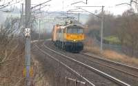 The Crewe Basford Hall - Coatbridge containers approaching Carluke on 11 February 2015 with the usual pair of Freightliner Class 86s in charge. Locomotive 86622 is leading the train on this occasion. <br><br>[Ken Browne 11/02/2015]