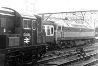 Looking out from the platform at the east end of Liverpool Street station in March 1970 as one of Stratford's Brush Type 4s no 1777 awaits its departure time with a train for Norwich. In the foreground is station pilot BTH Type 1 no D8234. The Type 1, delivered to Stratford new in 1960, was withdrawn the following March. By contrast, the Type 4, built by Brush Traction in 1964, remained in service for another 31 years, before its eventual withdrawal in 2001 as 47598.<br><br>[John Furnevel 10/03/1970]