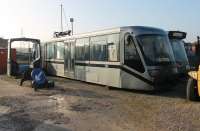 Preston Tram Power prototype City unit in open storage in a private yard in Preston in February 2015. The tram has previously run on the tramways at Blackpool and Birkenhead, but proposals to run a pilot system on the old Longridge line around Deepdale are presently stalled.<br><br>[Mark Bartlett 16/02/2015]