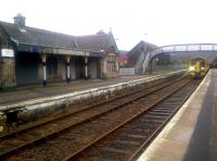 The 1435 departure for Inverness (1234 ex-Wick) pulling into Brora station on 16 February 2015.<br><br>[John Yellowlees 16/02/2015]