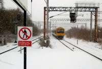 The 14.12 London Midland service to Lichfield Trent Valley (ex-Redditch) approaches the platform at Duddeston just before Easter 2013. [See image 42497 for a view in the opposite direction]<br><br>[Ken Strachan 24/03/2013]