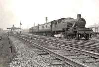 A Rutherglen train leaving Dalmuir Riverside on 11 April 1958 behind Stanier 2-6-2T 40152.<br><br>[G H Robin collection by courtesy of the Mitchell Library, Glasgow 11/04/1958]