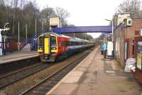 A pair of EMT Class 158 units (806 and 812) passing through Marple on 15 February 2015 while working the 5M10 Nottingham to Manchester empty stock move.<br><br>[John McIntyre 15/02/2015]