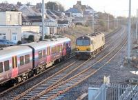 92010, on a light engine movement from Rugby to Mossend, passes TPE 350405 heading for Manchester Airport at Hest Bank on 17th February. <br><br>[Mark Bartlett 17/02/2015]