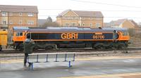 Shut that door! GBRf locomotive 66706 <i>Nene Valley</i> passes Peterborough on 10th February 2015. <br><br>[Colin McDonald 10/02/2015]