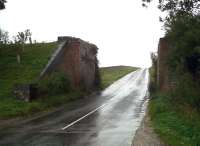 Views like this used to be quite common around the UK, but the march of progress - and deterioration of brickwork - has led to many demolitions. Looking south at Quinton on a soaking wet October day in 2010 [see image 45800]<br><br>[Ken Strachan 01/10/2010]