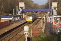 Looking over Marple station on 15 February 2015 with a Sheffield to Manchester service at the platform.<br><br>[John McIntyre 15/02/2015]