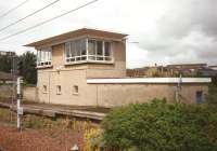 The former Airdrie signal box, situated in the remnant of the third platform, seen in July 1997. It was to survive in an increasingly dilapidated state until demolition 12 or 13 years later when platform 3 was fully rebuilt for the reinstated Airdrie to Bathgate Link.<br><br>[David Panton 17/07/1997]