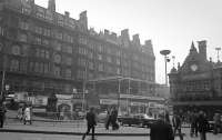 The St Enoch Hotel, former main line station and Subway in February 1975. The station had closed in 1966, the hotel was demolished in 1977 to be replaced by the St Enoch Centre and the Subway station became a travel centre (later a cafe) after the entrance was relocated further north on St Enoch Square.<br><br>[Bill Roberton /02/1975]