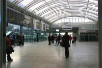 View over the spacious concourse at Haymarket on 18 February 2015 from the entrance through the original 1842 building. Ticket barriers are straight ahead and the exit to the Haymarket tram stop is off to the right. [See image 50433]<br><br>[John Furnevel 18/02/2015]