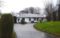 Former railway workers' housing beside the site of the goods yard at Alloway in 2015. The 1909 OS map shows this building and another smaller one - this would originally be two semi detached and the other detached - a pattern repeated at other stations. The original road access ran round the south of the yard, but now a new road has been built across the area it once occupied. The postal address remains 'Railway Cottages'.<br><br>[Colin Miller 22/02/2015]