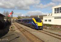 First Great Western 180102 Paddington bound at Moreton-in-Marsh on 27 February 2015. Surprising to see the station is still mechanically signalled with a manned signal box and GWR pattern lower quadrant signals in place, particularly given the line was recently upgraded back to double track.<br><br>[Peter Todd 27/02/2015]