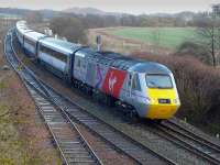 Power car 43300  with Virgin East Coast branding passes Inverkeithing East Junction on 1 March 2015 with the 13.47 Aberdeen - London Kings Cross service. <br><br>[Bill Roberton 01/03/2015]