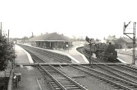 A Largs - St Enoch train calls at Kilwinning on 4 July 1959. In charge is BR Standard class 5 4-6-0 no 73123, a locomotive which spent its entire operational life at Corkerhill shed.<br><br>[G H Robin collection by courtesy of the Mitchell Library, Glasgow 04/07/1959]