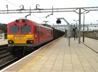 92015 looks distinctly Continental in its DBS livery [see image 20123] as it heads South through Bletchley with a long rake of Cargowaggons on 20 February. The Bedford line can be seen diverging from the WCML in the right background.<br><br>[Ken Strachan 20/02/2015]