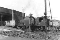 Taking on water at Ardrossan North on 24 May 1960. The locomotive is thought to be McIntosh Caledonian 3F 0-6-0T 56282. [Ref query 5143]<br><br>[G H Robin collection by courtesy of the Mitchell Library, Glasgow 24/05/1960]