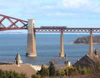 Passengers on the 1323 Cowdenbeath - Edinburgh Waverley service approaching South Queensferry on 4 March breath a collective sigh of relief, having safely completed their crossing of the Forth Bridge, after being <I>'buzzed'</I> by a Spitfire [see image 50544].  <br><br>[John Furnevel 04/03/2015]