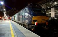 DRS 68002 on the rear of a returning charter (1Z54) from Wembley Central to Glasgow Central at Preston on 5 March 2015. [See image 50575]<br><br>[John McIntyre 05/03/2015]