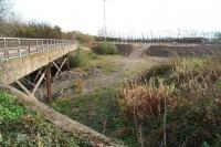 Looking east along Whitehill Road in October 2014 over the remains of the old Millerhill up reception sidings. Under current EGIP plans part of the old yard off to the right is earmarked to accommodate a new electric train depot.<br><br>[John Furnevel 26/10/2014]