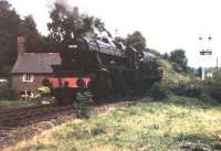 Early days on the Severn Valley with <I>Black 5</I> 45110 running round its train from Bridgnorth at Hampton Loade in 1973. At that time this was the southerly limit of operations on the line, which was operating on a <I>one engine in steam</I> basis, hence the armless bracket signal at the north end of the loop. <br><br>[Mark Bartlett //1973]