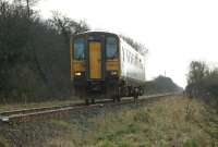 An Ormskirk to Preston service passes Ulnes Walton on 7 March 2015. The railcar has just passed the site of the junction that led to the Ulnes Walton ammunition storage site, constructed in the early 1940s and before that a siding to the Littlewood Brick and Tile Works.<br><br>[John McIntyre 07/03/2015]