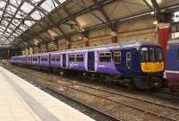 New kid in town. 319363, sporting its recently acquired <I>'Northern Electrics'</I> livery, stabled in Liverpool Lime Street platform 1 on the afternoon of 12 March 2015.<br><br>[John McIntyre 12/03/2015]