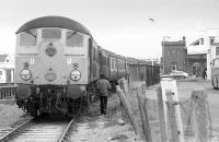 Grand Scottish Tour No.19 stands at Fort William after arrival from Edinburgh on 4 May 1974.  All would be swept away the following year.<br><br>[Bill Roberton 04/05/1974]