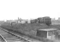 Ex-GER F4 2-4-2T no 67164 attracts a small group of admirers at St Combs station in July 1951, just a month before its withdrawal.<br><br>[G H Robin collection by courtesy of the Mitchell Library, Glasgow /07/1951]