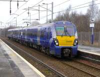 334005 calls at Coatbridge Central on 17 March 2015 with a Cumbernauld - Dalmuir service.<br><br>[Bill Roberton 17/03/2015]