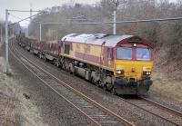 DBS 66199 approaching Fiddlers Gill after passing Braidwood on 19 March with the Dalzell - Tees empty steel train.<br><br>[Bill Roberton 19/03/2015]