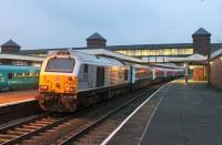 Silver liveried 67029 <I>Royal Diamond</I> propels the daily Holyhead to Cardiff <I>Y Gerallt Gymro</I> service away from Llandudno Junction on 16th March 2015. The train reverses at Chester and the Class 67 will lead the train through Wrexham and down the <I>Welsh Marches</I> route to South Wales. [See image 50681]<br><br>[Mark Bartlett 16/03/2015]