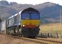 DRS 66303 with the 4D47 Inverness - Mossend intermodal on 21 March, approximately 2 miles north of Pitlochry.<br><br>[Bill Roberton 21/03/2015]