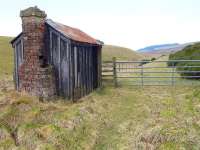 A platelayers hut still survives at Threeburnford on the Lauder Light Railway in March 2015. The line closed in 1958. [Ref query 8855]<br><br>[Bill Roberton 18/03/2015]