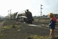 A young fan  looks on as the <I>Speyside Express</I> enters Stirling on 18 September 1976. 60009 <I>Union of South Africa</I> took the special from Edinburgh as far as Perth, where 47037 took over for the journey to Aviemore. Black 5 5025 took charge at Aviemore for a trip over the Strathspey Railway to Boat of Garten. <br><br>[John Robin 18/09/1976]