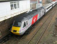 Sporting its new Virgin stripe, 43313 passes under Arbroath signal box on 22 March 2015, bringing up the rear of a Virgin Trains East Coast Aberdeen-Kings Cross train. <br><br>[Sandy Steele 22/03/2015]