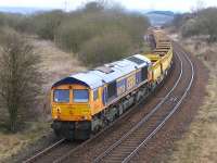 GBRf 66759 brings up the rear of a Longannet - Millerhill ballast train passing the former Lumphinnans Central Junction on 29 March.<br><br>[Bill Roberton 29/03/2015]