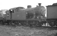 N7 0-6-2T no 69714 in a siding at Stratford shed on 9 October 1961. The 1928 ex-GER locomotive, which would have spent most of its life operating over the London suburban lines, had been withdrawn from service a month earlier. One of the 134 examples of the class built has been preserved [see image 33260]. <br><br>[K A Gray 09/10/1961]