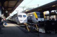 A snabbtag (high speed train) for Stockholm and a pendeltag at Gothenburg Central on 15 March 2015.<br><br>[Colin Miller 15/03/2015]