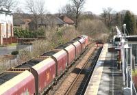 A Hunterston - Longannet coal train rumbles east through Alloa station on 31 March 2015, some five miles short of its destination.<br><br>[John Furnevel 31/03/2015]