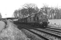 A northbound partially fitted freight approaches Dalmeny Junction at around 15:00 on a fine early spring afternoon in 1972 behind Gateshead based EE Type 3 No. 6763. This might be the early afternoon Millerhill to Inverness working (although if so it is either running rather late or has been retimed from what it had been a couple of years earlier). Strictly speaking, a train to Inverness should have been displaying an 8J reporting number, but more often than not in that era internal ScR freights just showed the train classification without a destination code. The appearance of a split headcode box class 37 from the north-east of England was perhaps rather unusual north of Edinburgh. Thought to have been taken in early April 1972.<br><br>[Bill Jamieson /04/1972]