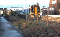 APTs at Bathgate! An afternoon train for Newcraighall waits to leave Bathgate terminus on 5 December 2004, with the station's two Automatic Public Toilets standing alongside.<br><br>[John Furnevel 05/12/2004]