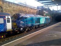 DRS 68004 <I>Rapid</I> about to leave Haymarket platform 1 on 9 April 2015 with a morning Fife commuter train for Waverley.<br><br>[John Yellowlees 09/04/2015]